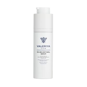 The image shows a bottle of "5% Bio-Retinol Serum" from the brand Valeriya Life, featuring a sleek, white pump bottle. The label on the bottle displays the product name and key ingredients in a clean, modern font. The bottle is placed against a light-colored background, emphasizing its minimalist and elegant design.