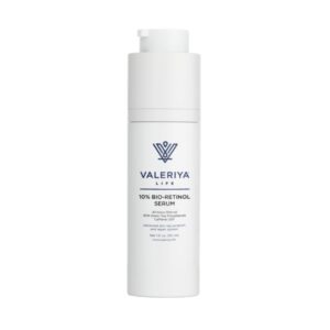 The image shows a bottle of "10% Bio-Retinol Serum" from the brand Valeriya Life, featuring a sleek, white pump bottle. The label on the bottle displays the product name and key ingredients in a clean, modern font. The bottle is placed against a light-colored background, emphasizing its minimalist and elegant design.