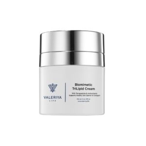 The image shows "Biomimetic TriLipid Cream" from the brand Valeriya Life in a luxurious white jar with a silver metallic lid. The jar features a sophisticated label with product benefits and key ingredients, focusing on its advanced formula designed to restore and repair the skin's natural barrier. The cream is formulated with lipids to hydrate and nourish the skin. The jar is positioned on a soft, neutral background, emphasizing its high-end, professional appearance and sleek design.