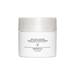 The image shows a jar of "Skin Balancing Squalane Moisturizer" from the brand Valeriya Life. in a white, cylindrical jar with a beige cap. The label highlights the product’s key ingredients, benefits and skin recommended skin types. The moisturizer is formulated with squalane to deeply hydrate and balance the skin’s moisture levels, promoting a smooth and healthy complexion. The bottle is elegantly placed on a soft, neutral background, emphasizing its modern, minimalist design and high-quality packaging ideal for everyday use in a skincare routine.