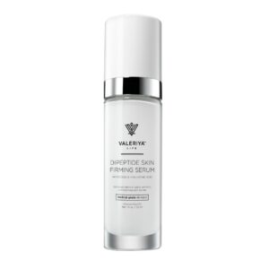 The image shows a bottle of "Dipeptide Skin Firming Serum" from the brand Valeriya Life, featuring a sleek, white bottle with a white cap and silver ring giving it an elegant look. The label on the bottle displays the product name, key ingredients and benefits in a clean, modern font. The bottle is placed against a light-colored background, emphasizing its minimalist and elegant design.